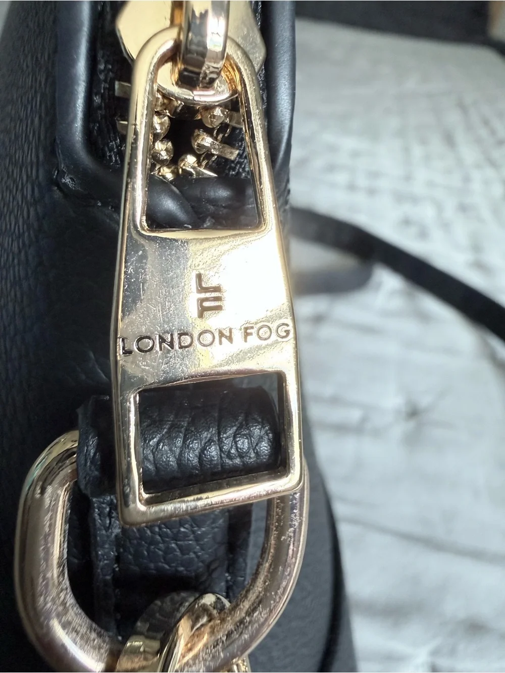 London Fog Black and Gold Pebble-Textured Dome Black Crossbody